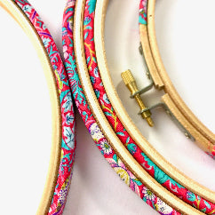 Red embroidery hoop frame,  wrapped in 'Strawberry Thief' fabric. This hoop features the Iconic 'Strawberry Thief' fabric designed by William Morris, a name famous within the Arts and Crafts movement.