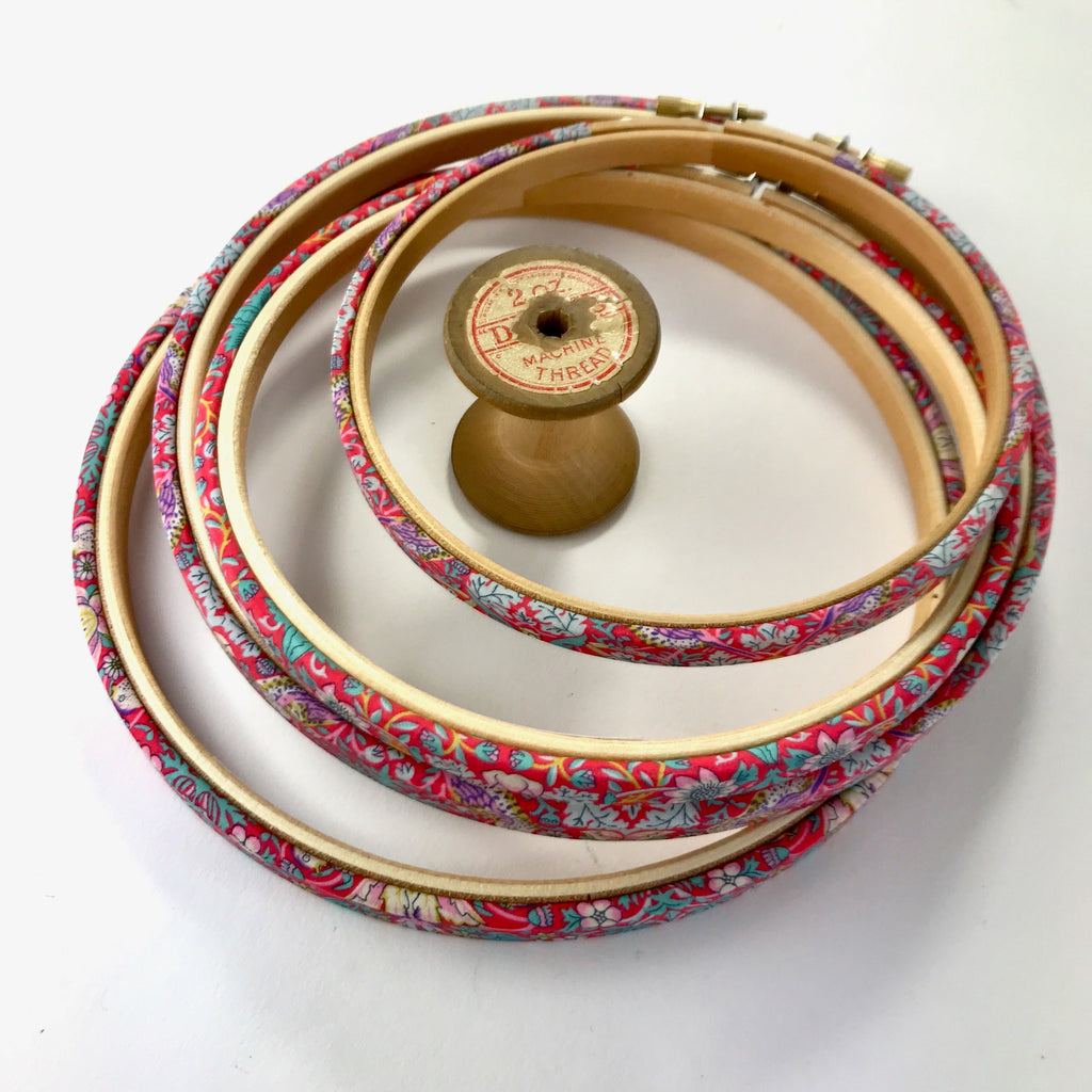 Red embroidery hoop frame,  wrapped in 'Strawberry Thief' fabric. This hoop features the Iconic 'Strawberry Thief' fabric designed by William Morris, a name famous within the Arts and Crafts movement.