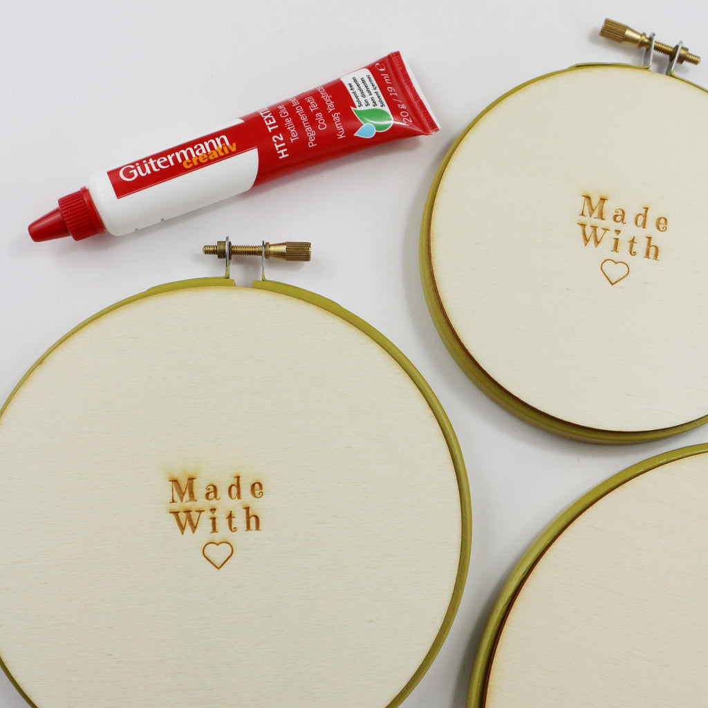 embroidery hoop backs. wooden hoop butts with  Gutermann Textile glue.