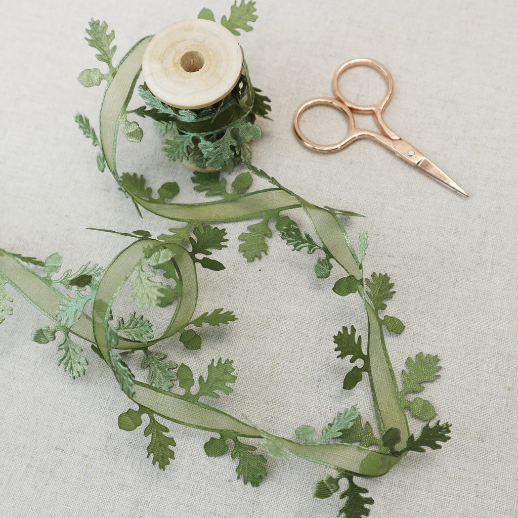 acorn ribbon with rose gold scissors