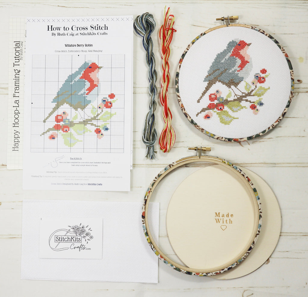 Cross-stitch kit with pretty embroidery hoop and wooden back.