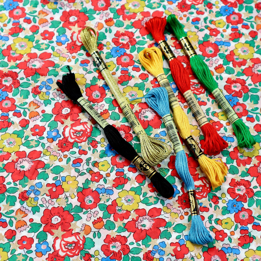 Christmas embroidery thread collection with Betsy Star fabric.