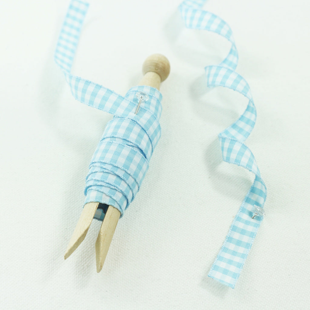 baby blue gingham ribbon on wooden peg