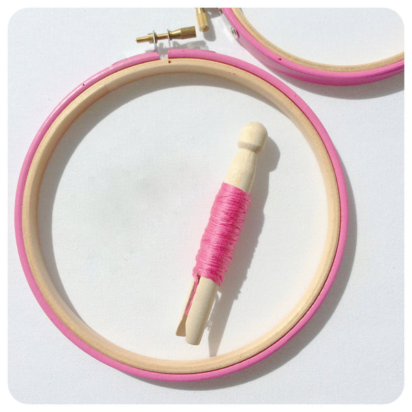 Pink embroidery hoop, painted with a bright pink paint