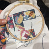 Cross Stitch WIP in small embroidery hoop