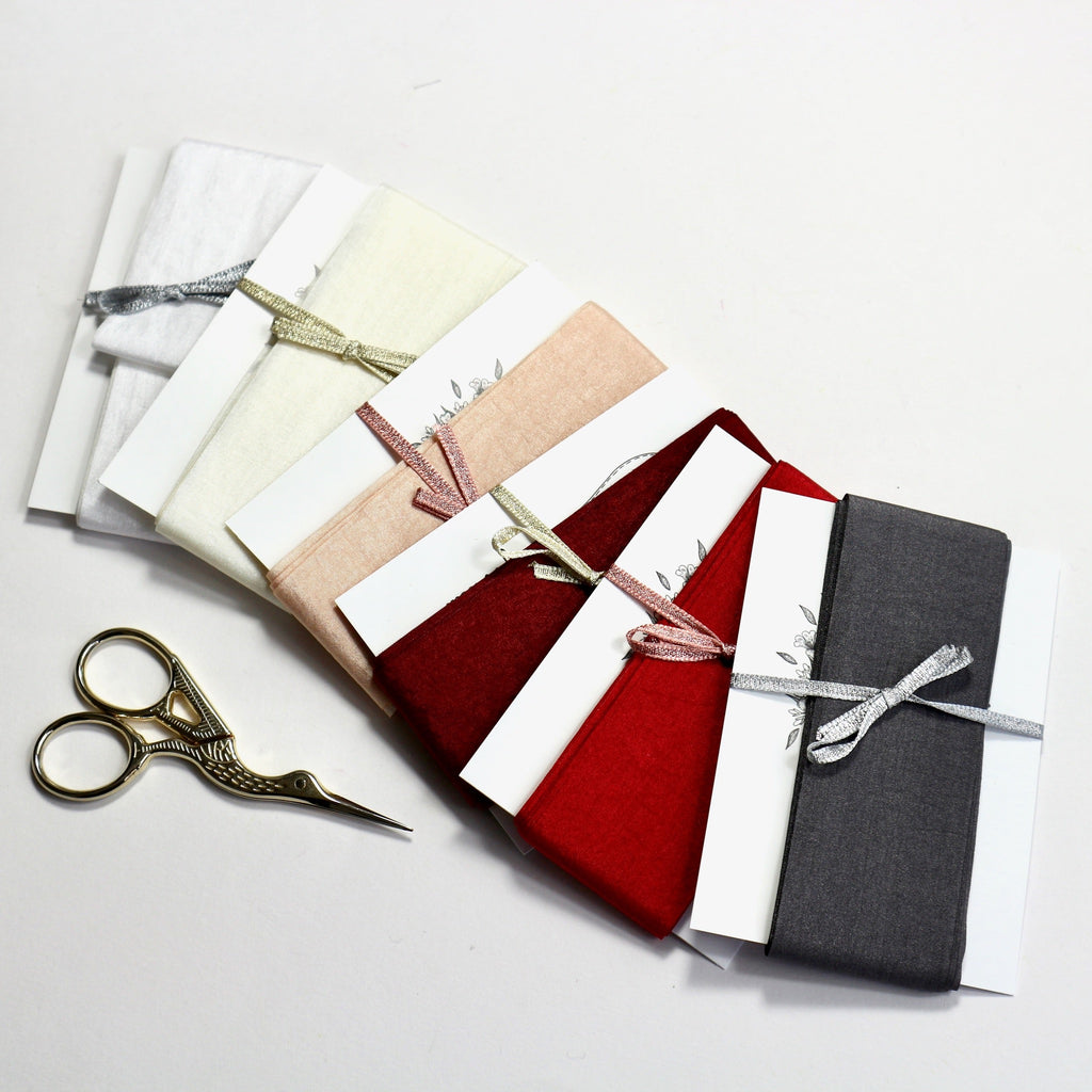 5 meters of 38mm wide silk ribbon in 7 different colours.