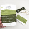 green luxurious ribbons for gift wrapping