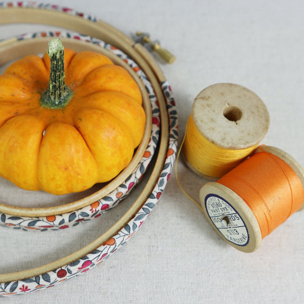 embroidery hoops covered with autumn berry's