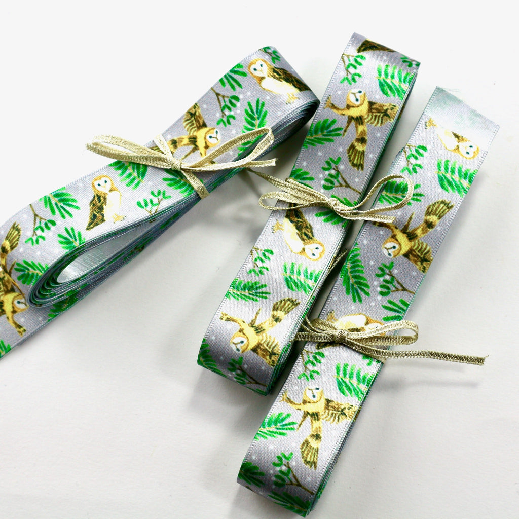 bundles of silver grey satin ribbon with an owl and woodland design.