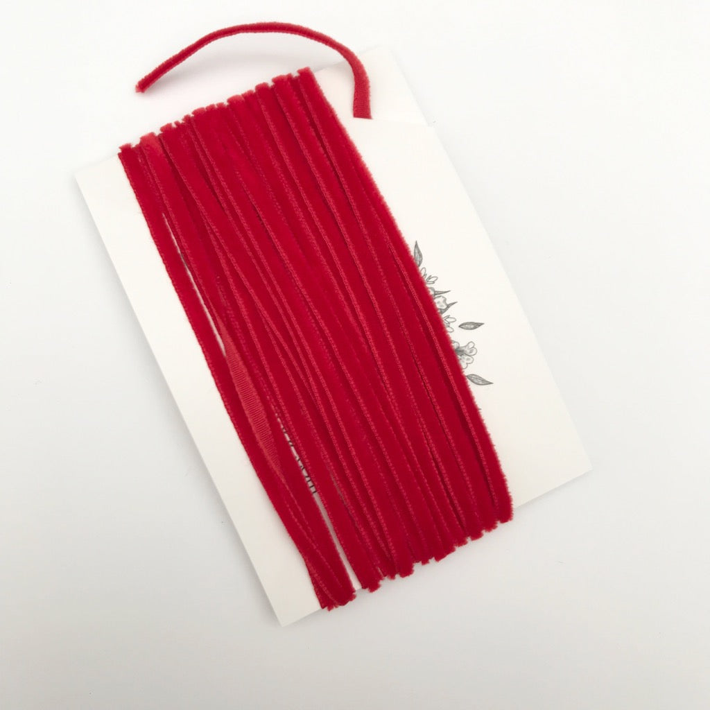5 meters of dark red velvet cord ribbon.