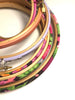 Set of embroidery hoops with floral patterns on a white background