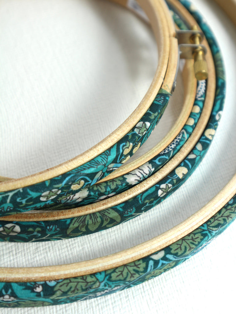 wooden embroidery hoop wrapped in green strawbery thief tana lawn cotton