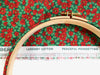 Embroidery hoop on Lazenby Cotton 'Peaceful Poinsettias' fabric