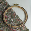 wooden embroidery hoop wrapped in strawbery thief tana lawn cotton