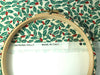 Embroidery hoop with holly pattern fabric and 'Made in Italy' label