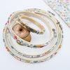 grey pretty embroidery hoops with vintage cotton reel