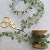 sheer green ribbon with satin oak leaf edge