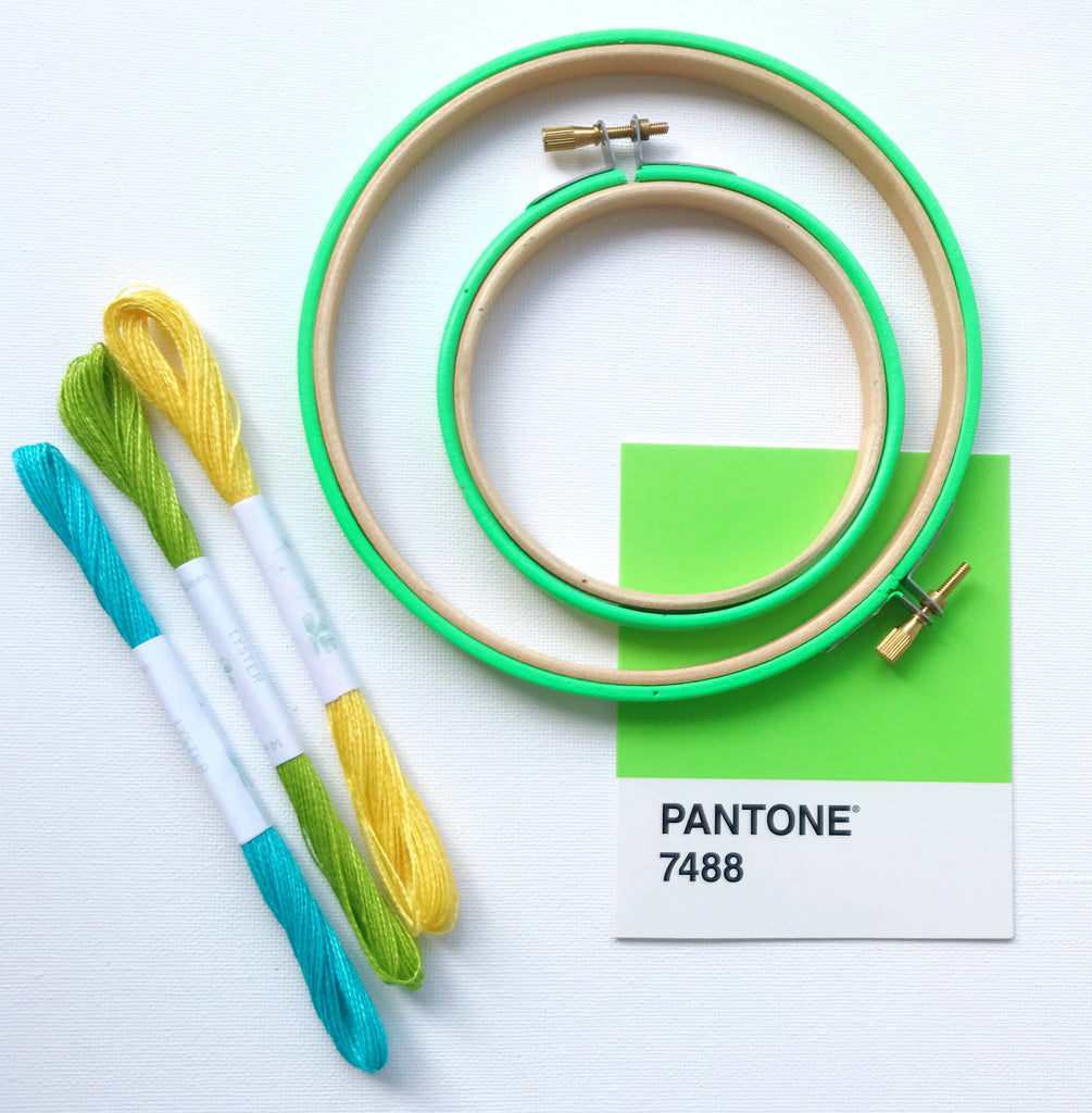 Pantone neon green embroidery hoops with flax embroidery threads 
