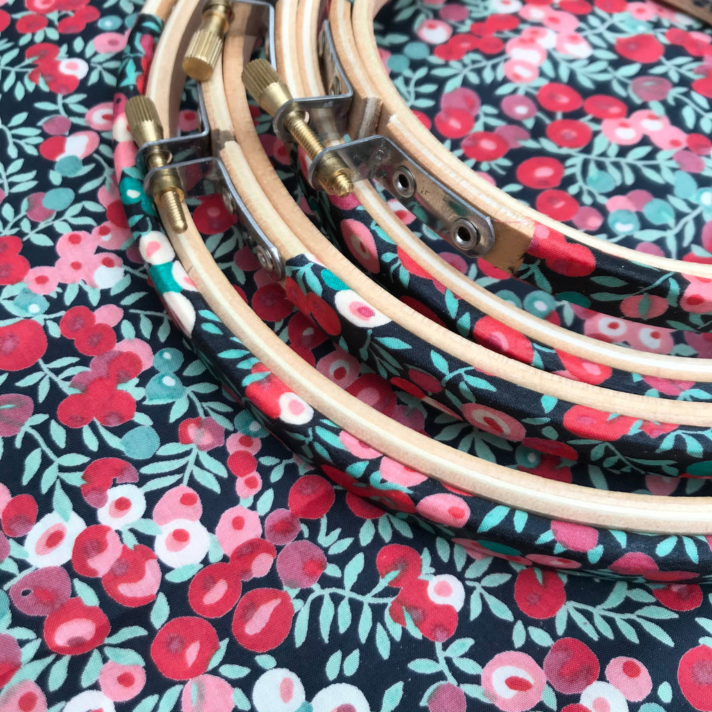 4 wooden embroidery hoops wrapped in Liberty of London Wiltshire fabric.