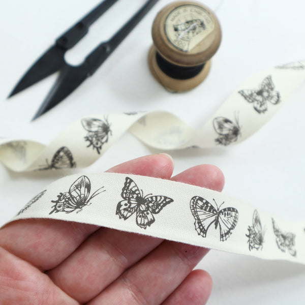 ivory cotton feel, tape with printed butterfly ribbon, 20mm wide