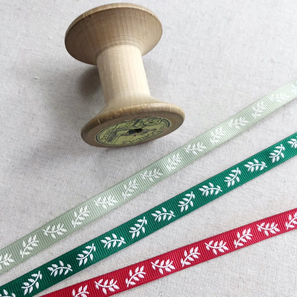 Christmas gift wrapping ribbon with leaf print