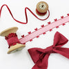 Dark red faux silk, velvet ribbon and sheer ribbon with a satin heart edge. 