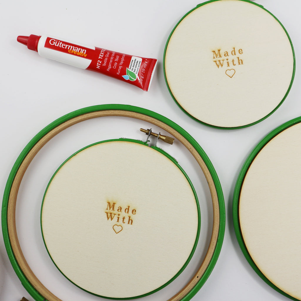embroidery hoops with wooden backs.