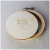 3 inch enbroidery hoop with wooden back. Made with love.