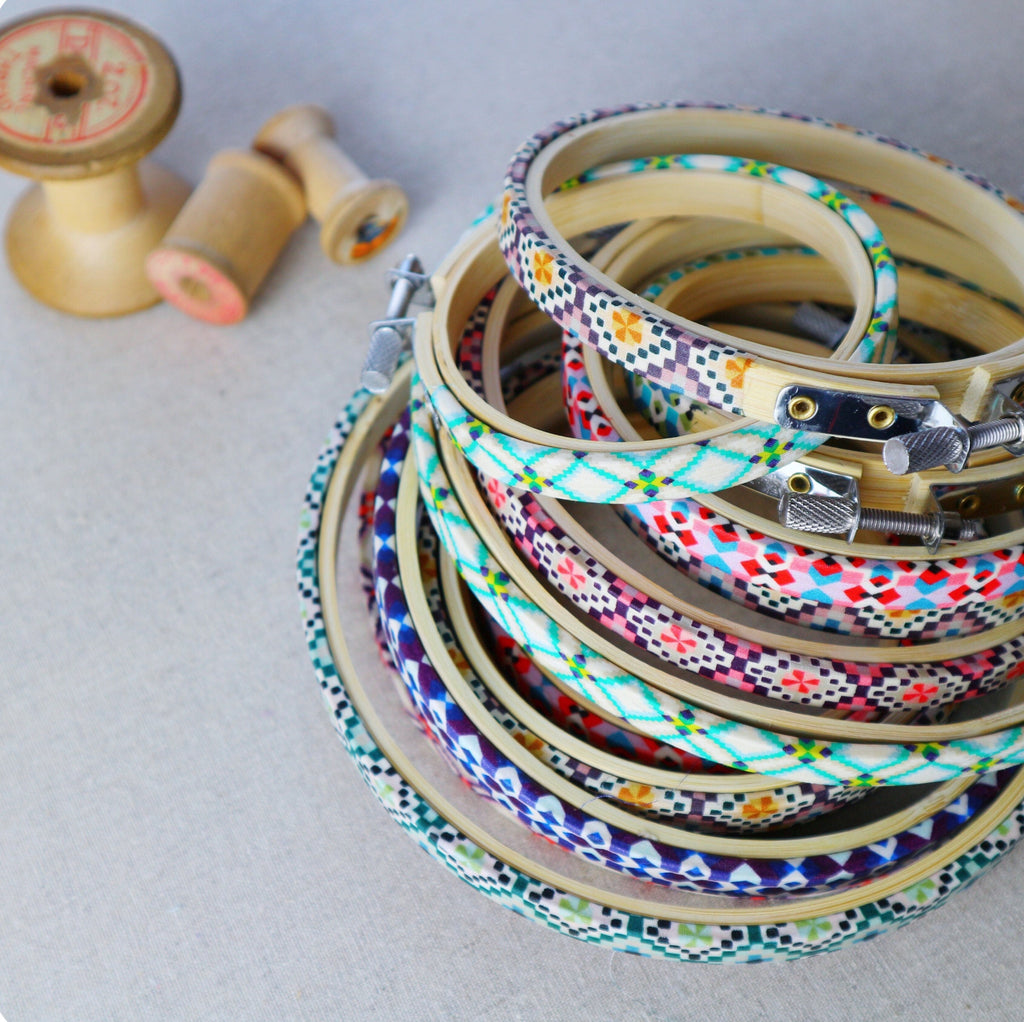 Stack of geometric Liberty Fabric  Tana Lawn Covered Embroidery Hoops - StitchKits Crafts