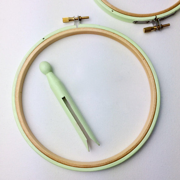 Light green embroidery hoop. Wooden hoop painted in  a pale green.