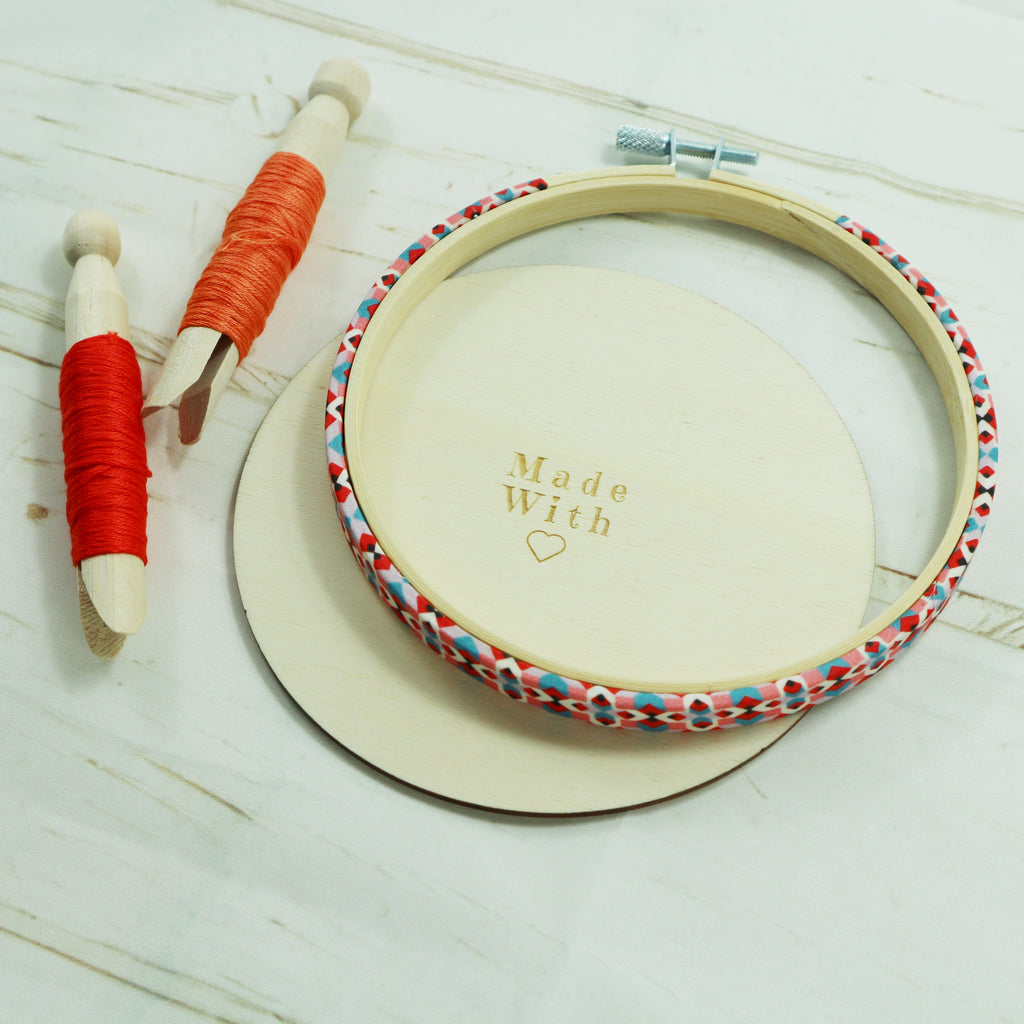 Cross stitch  finishing in an embroidery hoop