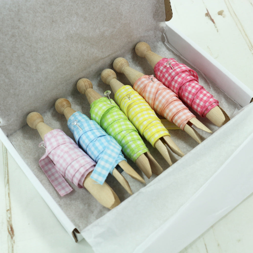 ribbon gift box. six coloured gingham ribbons