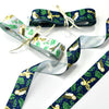 Bundles of woodland owl ribbon in navy blue and silver grey.