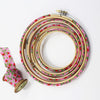 Pink embroidery hoops with red strawberries for modern embroidery.